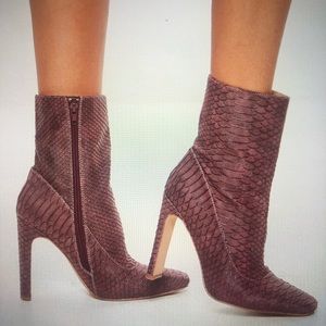 snakeskin heeled boots